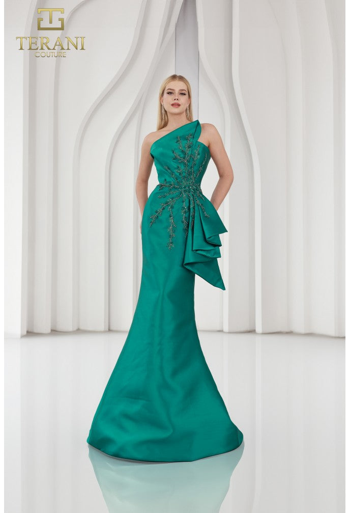 Model wearing Terani Couture 251E4265 off-shoulder pleated gown with fitted silhouette and high slit, perfect for gala, red carpet, or formal evening event.