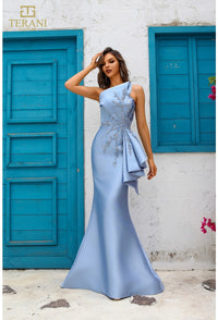 Model wearing Terani Couture 251E4265 off-shoulder pleated gown with fitted silhouette and high slit, perfect for gala, red carpet, or formal evening event.