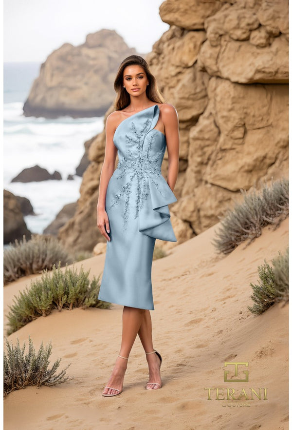 Model wearing Terani Couture 252C5032 one-shoulder floral embroidered gown with ruffle accent in fitted silhouette.