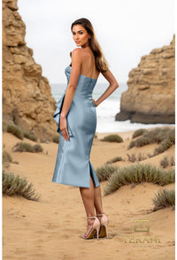 Model wearing Terani Couture 252C5032 one-shoulder floral embroidered gown with ruffle accent in fitted silhouette.