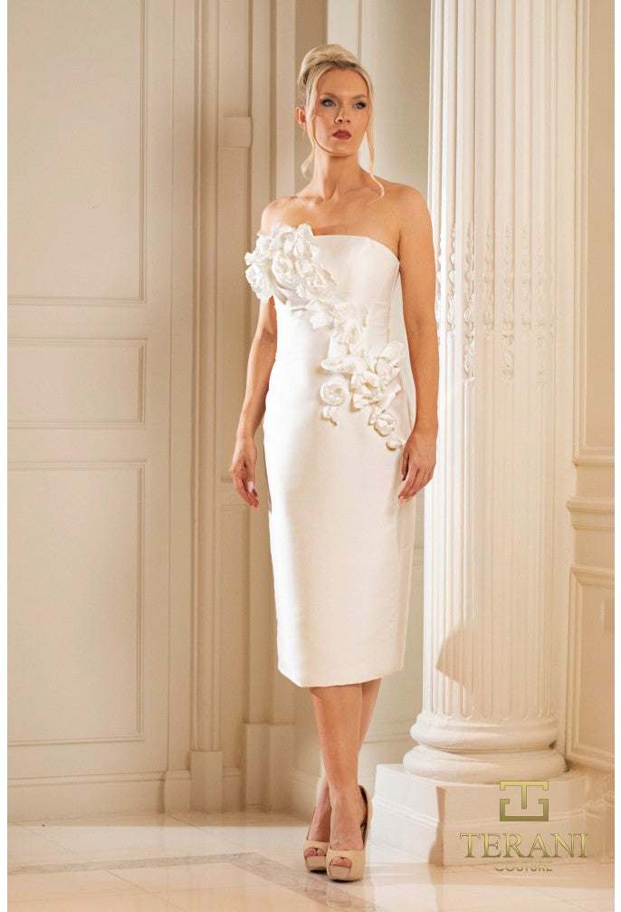 Model wearing Terani Couture 252C5042 strapless bodycon dress with 3D floral appliqués, fitted silhouette, and midi length.