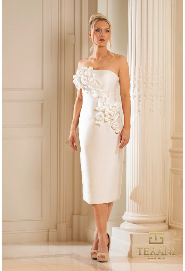 Model wearing Terani Couture 252C5042 strapless bodycon dress with 3D floral appliqués, fitted silhouette, and midi length.