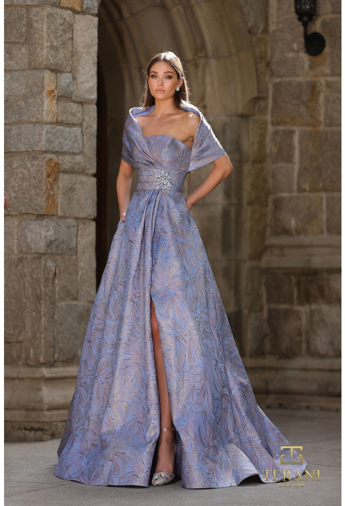 Woman in a purple evening gown standing in front of a stone archway.