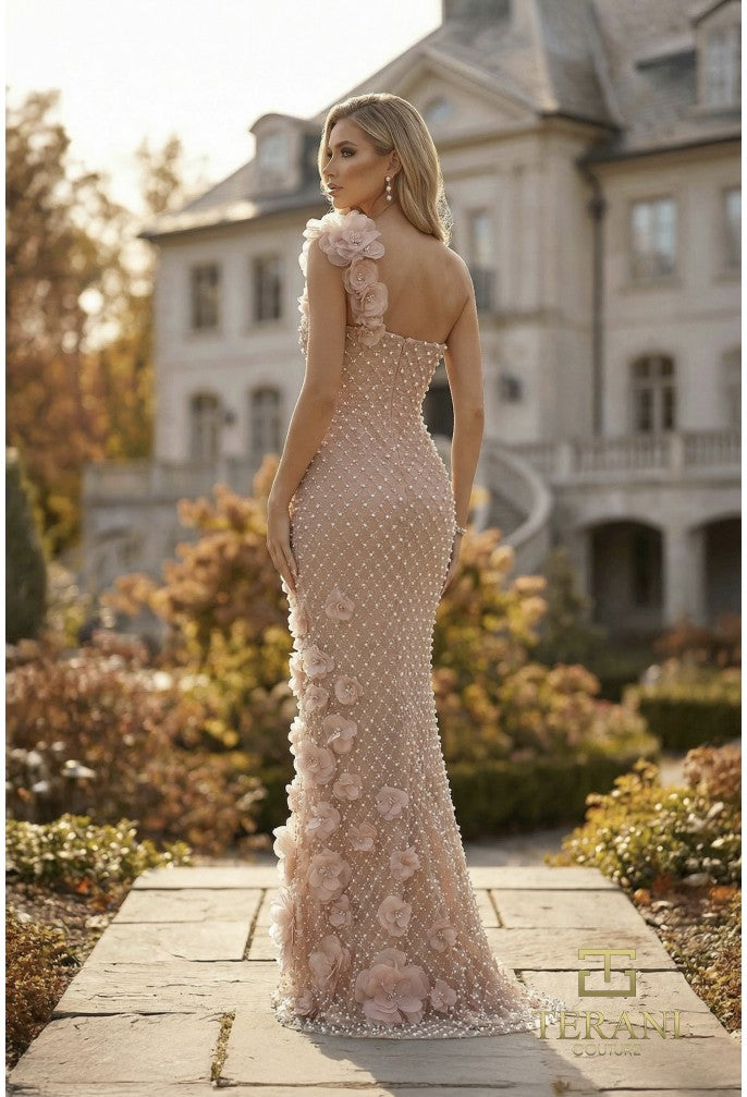 Model wearing Terani Couture 262GL7152 one-shoulder evening gown featuring floral appliqués, intricate beadwork, and a fitted floor-length silhouette.