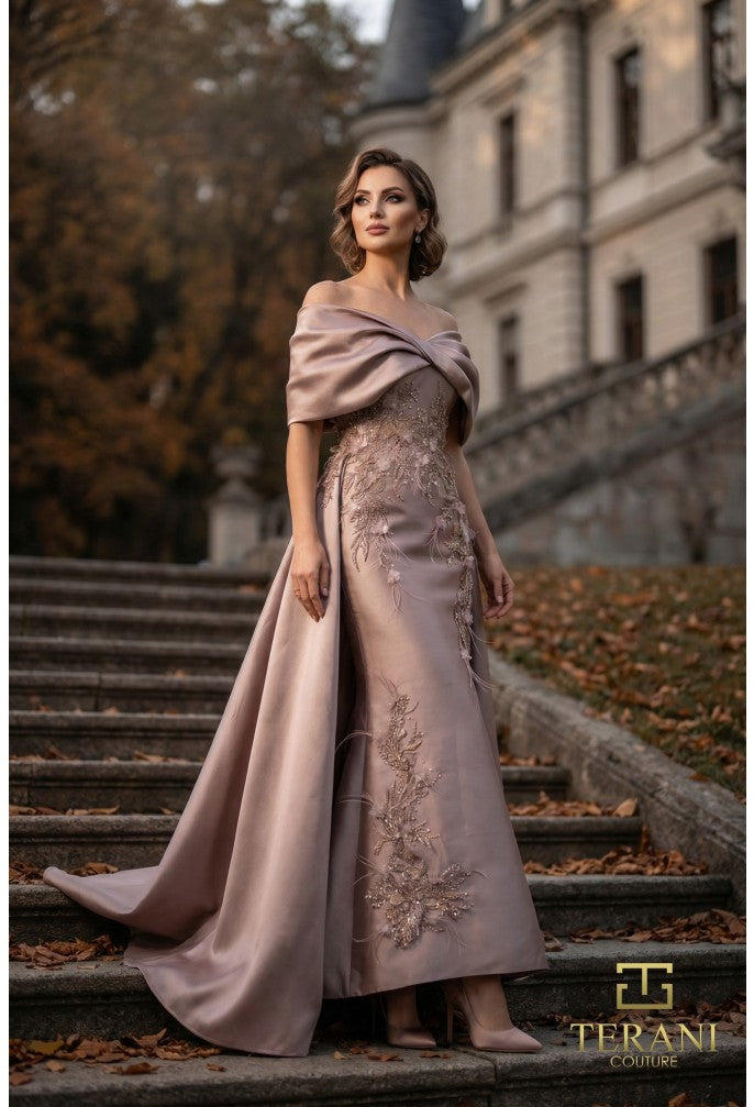 Woman in a elegant dress standing on steps with a castle-like building in the background