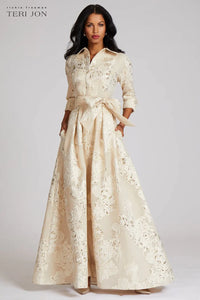 Model wearing Teri Jon 207015 floral shirt gown with a collared neckline, sash belt, three-quarter sleeves, and full A-line skirt.