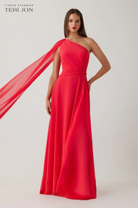 Model wearing Teri Jon 266020 one-shoulder evening gown with cape sleeve detail.