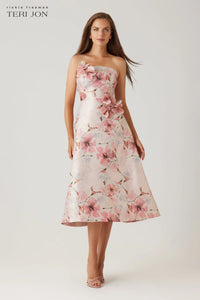 Model wearing Teri Jon 269201 strapless fit and flare dress with 3D floral appliqués.