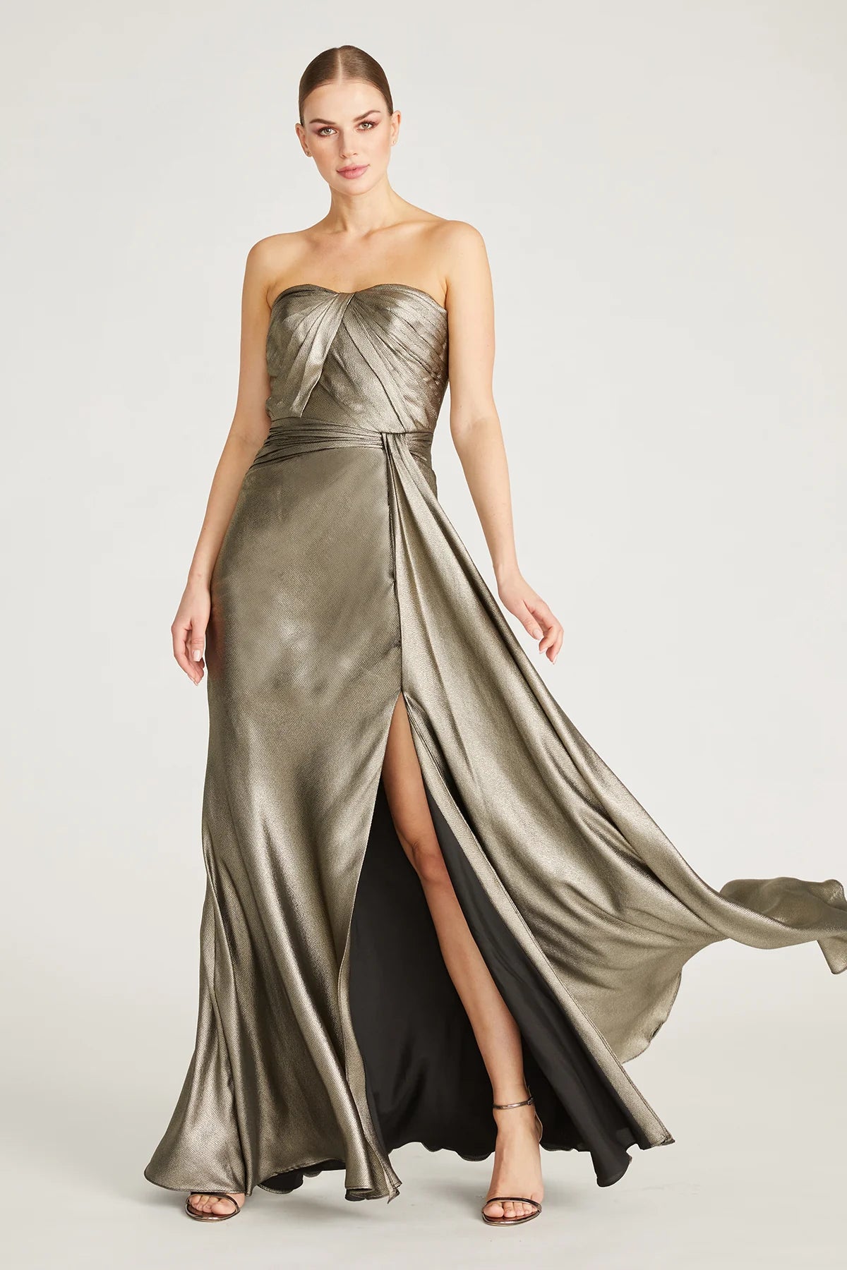Discover sophistication with Theia's strapless satin gown featuring a sweetheart neckline and elegant column silhouette. Ideal for special evenings and mother-of-the-bride/groom occasions. Available at Madeline's Boutique in Toronto and Boca Raton, Florida.