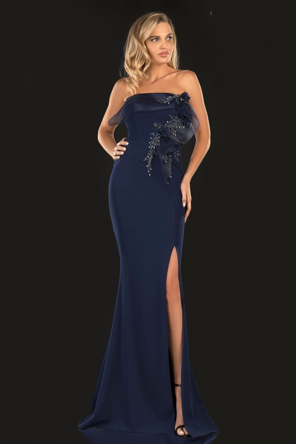 Gorgeous strapless column dress by Terani Couture, style number 2021E2818, adorned with sculpted horsehair and 3D flowers. Available at Madeline's in Toronto, Canada, and Boca Raton, Florida.