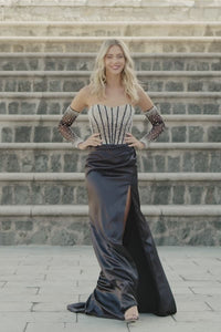 Video of Black Sherri Hill prom dress style #55536, available at Madelines Boutique. This dress features a fitted silhouette, sheer bodice with beaded embellishments, and a long flowing skirt