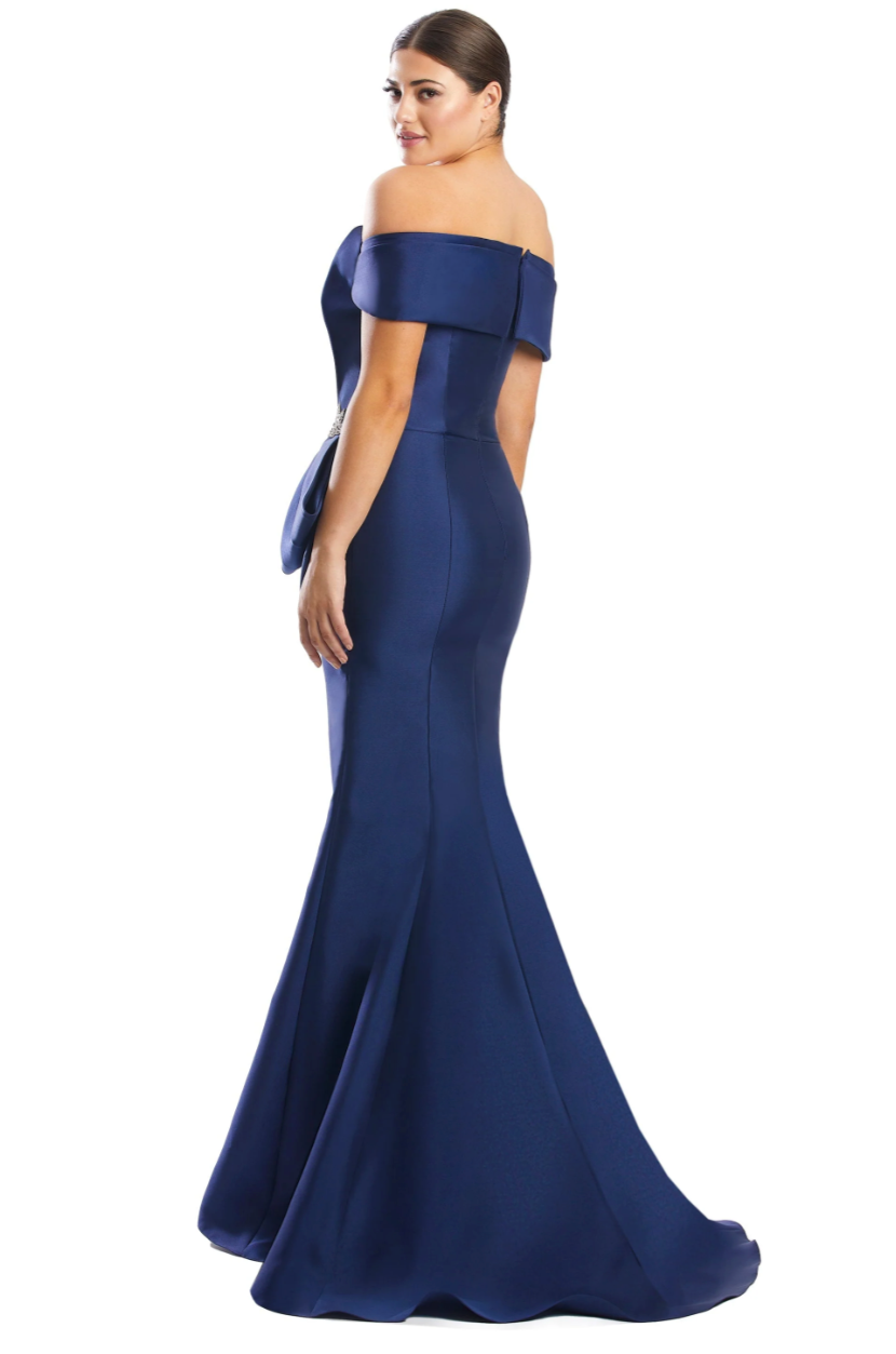 Daymor 1783 Off-the-Shoulder Gown with Statement Bow - An elegant gown featuring an off-the-shoulder neckline, statement bow with embellishment, column silhouette, and hidden back zipper.