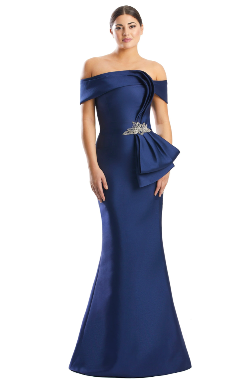 Daymor 1783 Off-the-Shoulder Gown with Statement Bow - An elegant gown featuring an off-the-shoulder neckline, statement bow with embellishment, column silhouette, and hidden back zipper.