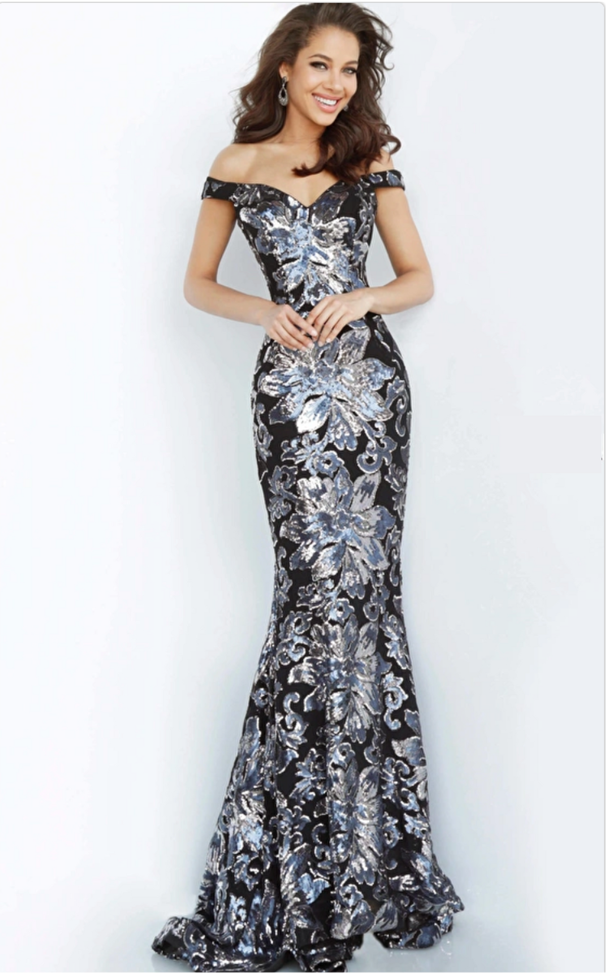 Shop Jovani 63516 Off the Shoulder Sweetheart Neck Dress in Grey, Copper/Gold, and Black/Gunmetal. Sequin details and sleeveless silhouette make it perfect for evening events, weddings, and black tie occasions. Available at Madeline's Boutique