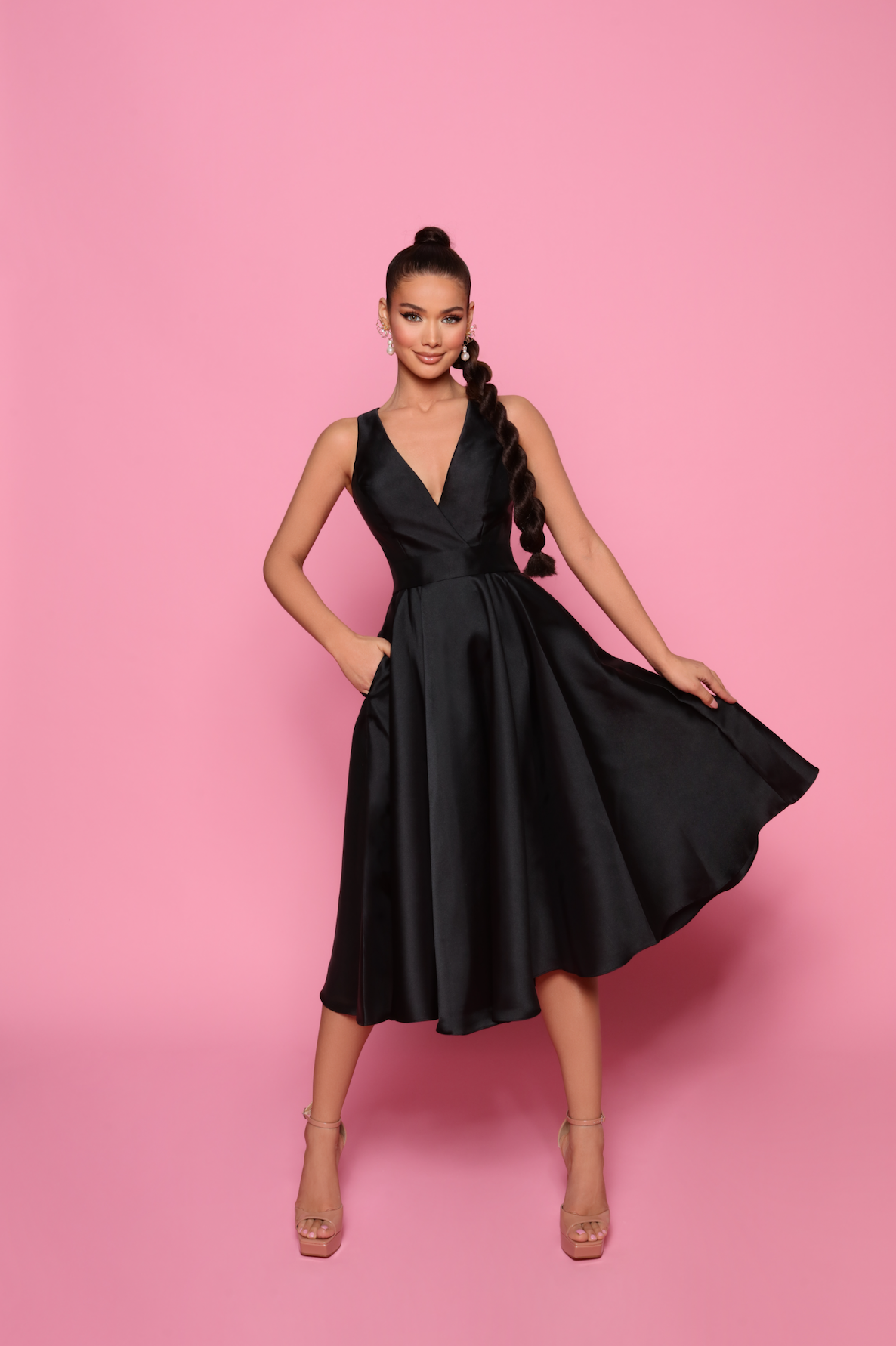 NEW ARRIVAL! Nicoletta Style number NP150. A beautful and fun cocktail dress you can wear during a night out with your significant other. Available at Madeline's Boutique in Toronto, Ontario and Boca Raton, Florida.