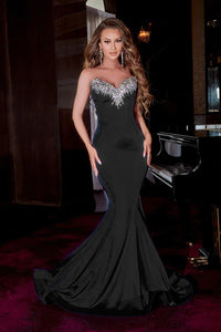 Captivating black mermaid dress by Portia & Scarlett, adorned with intricate crystal beading and stones, sold by Madeline's Boutique in Toronto, Canada, and Boca Raton, Florida.