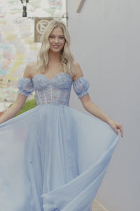 Video of Sheri Hill 55482 Chiffon prom dress with lace corset top, detachable balloon sleeves, and lace-up back in periwinkle and aqua colors sold by Madelines Boutique, Sherri Hill style #55482