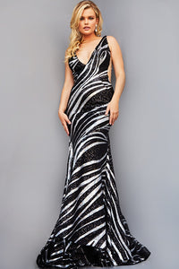 Jovani Dress Style 22314 - Two-tone sequin prom dress with form-fitting silhouette, floor length skirt, sleeveless bodice with illusion sides, plunging V neck, and open back. Available in Black/Silver or Nude/Silver/Gold colors. Sold by Madeline's.
